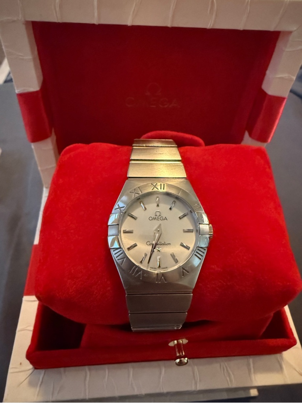 Omega Silver Stainless Steel Watch with Red Presentation Box Accents